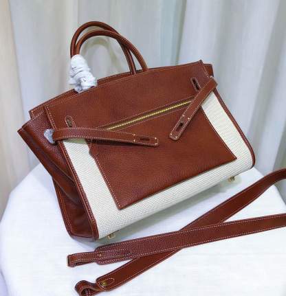Leather Saddle Bag With Contrast Stitching, Exterior