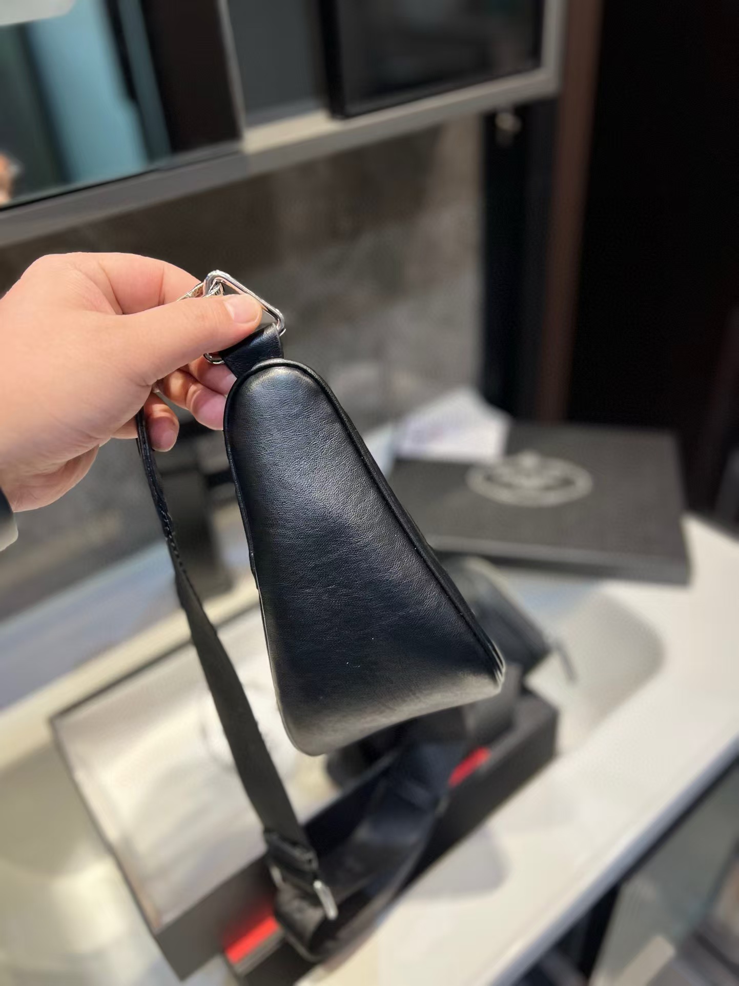 Triangle leather mini-bag