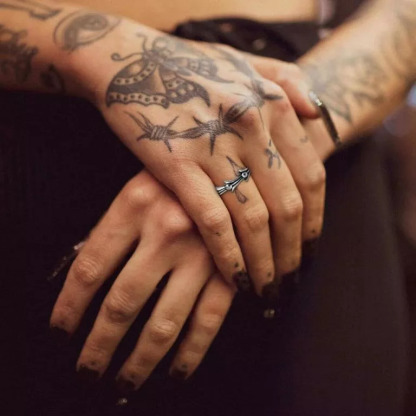 CROSS TAIL RING