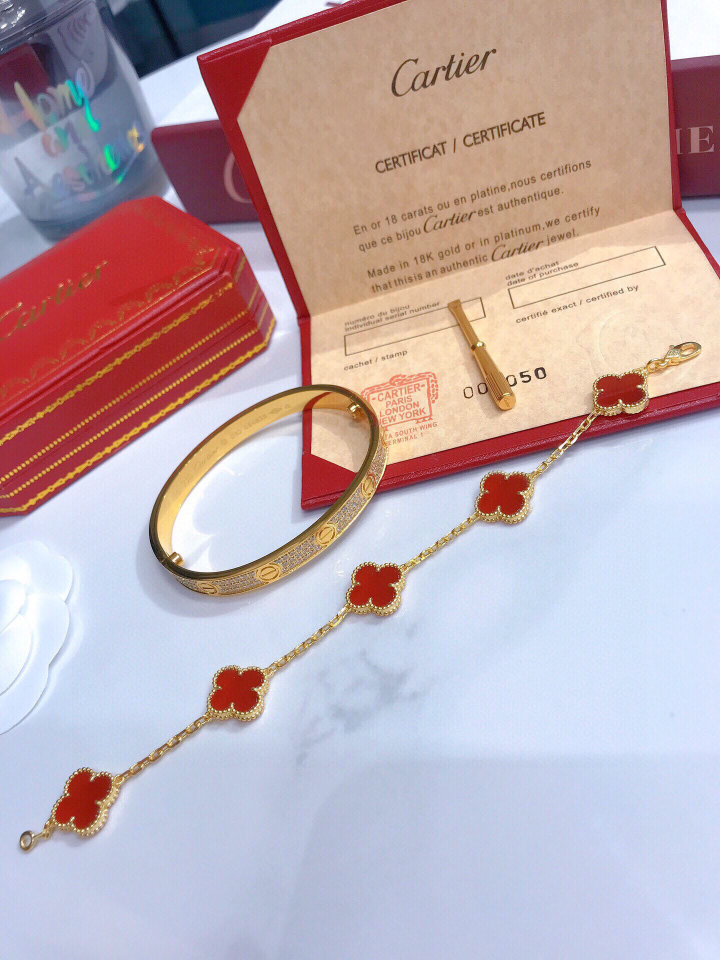 LOVE BRACELET, DIAMOND-PAVED + Vintage Alhambra bracelet, 5 motifs