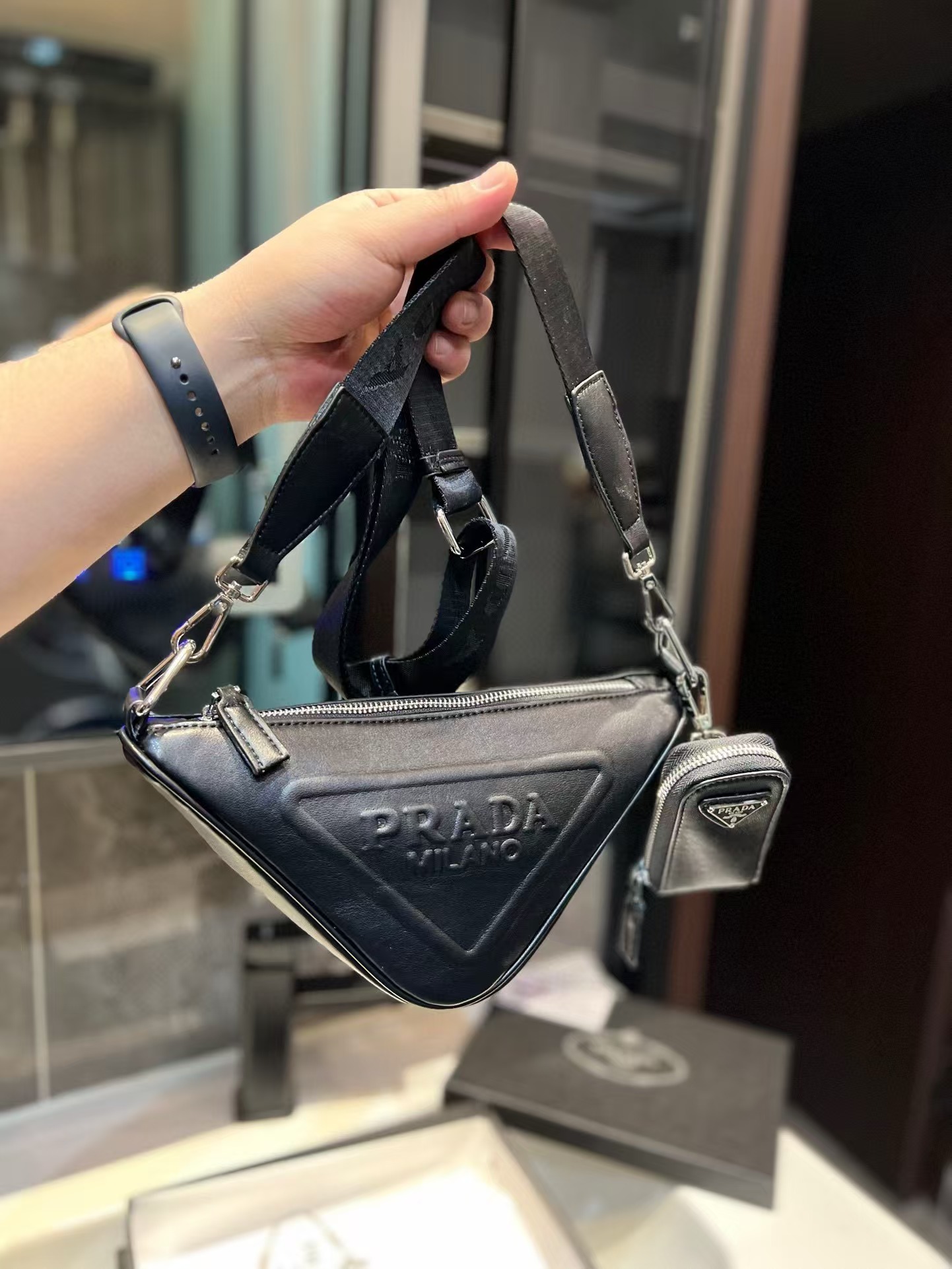 Triangle leather mini-bag