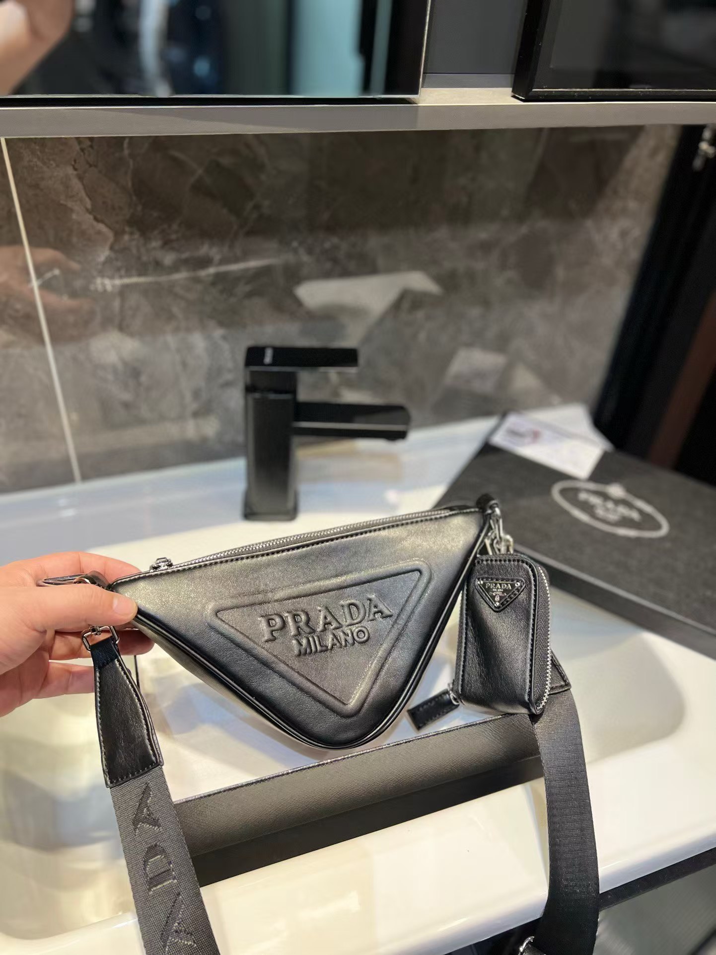 Triangle leather mini-bag