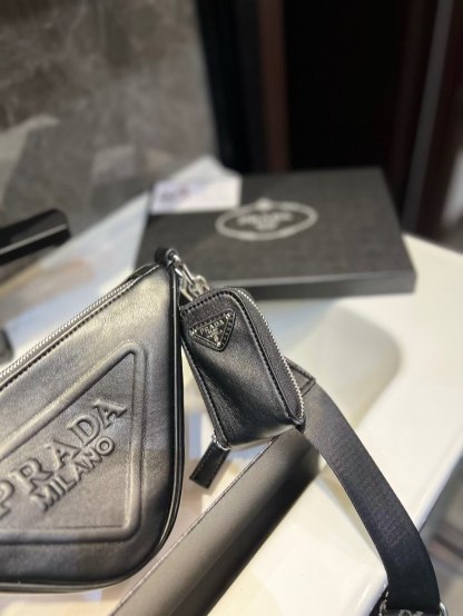 Triangle leather mini-bag