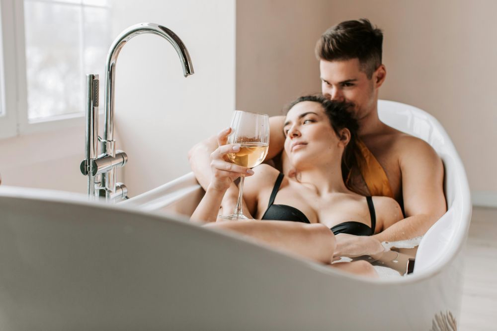 Couple enjoying a shower scene with soft blue light