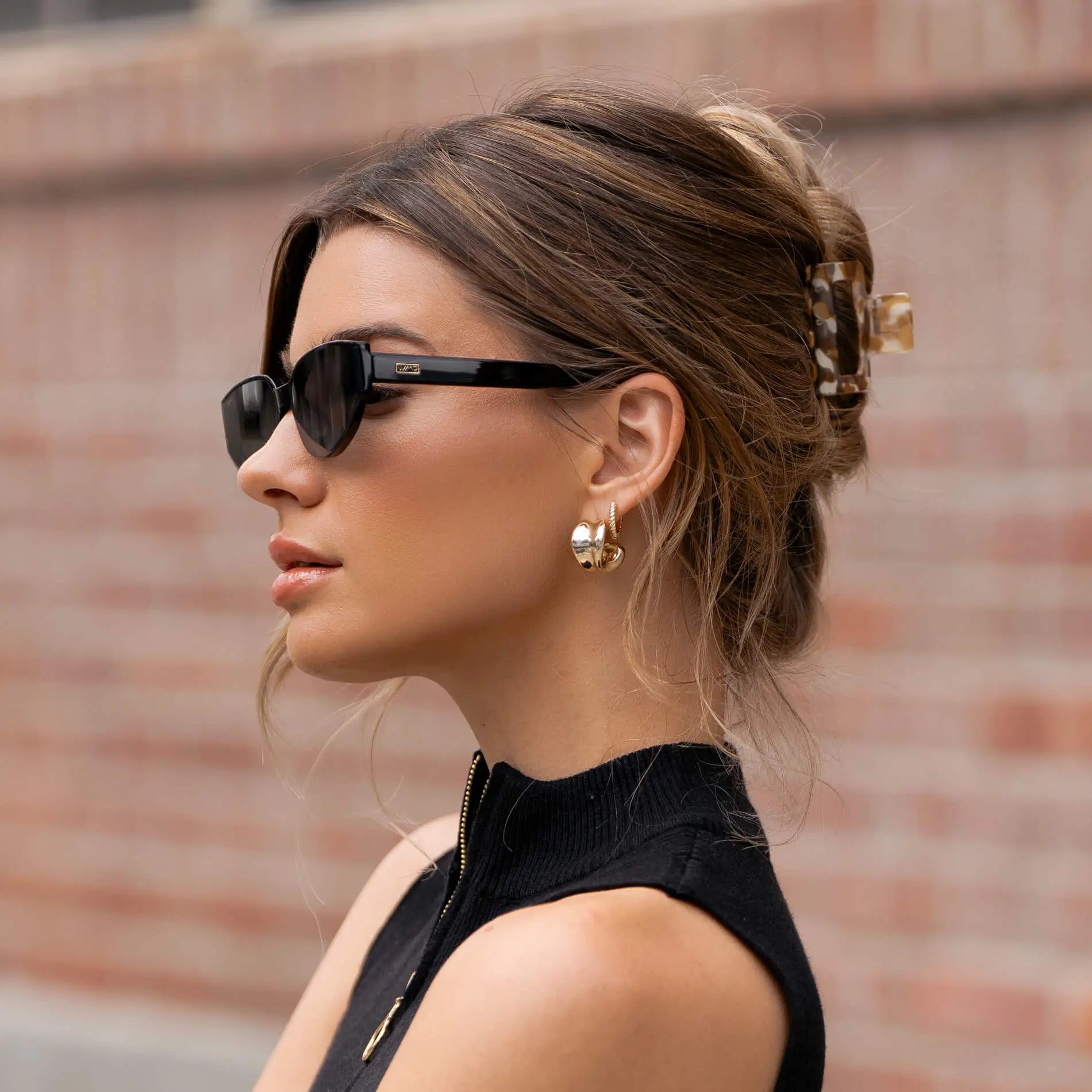 Aurora Astra cat-eye sunglasses in Black with triple black lens