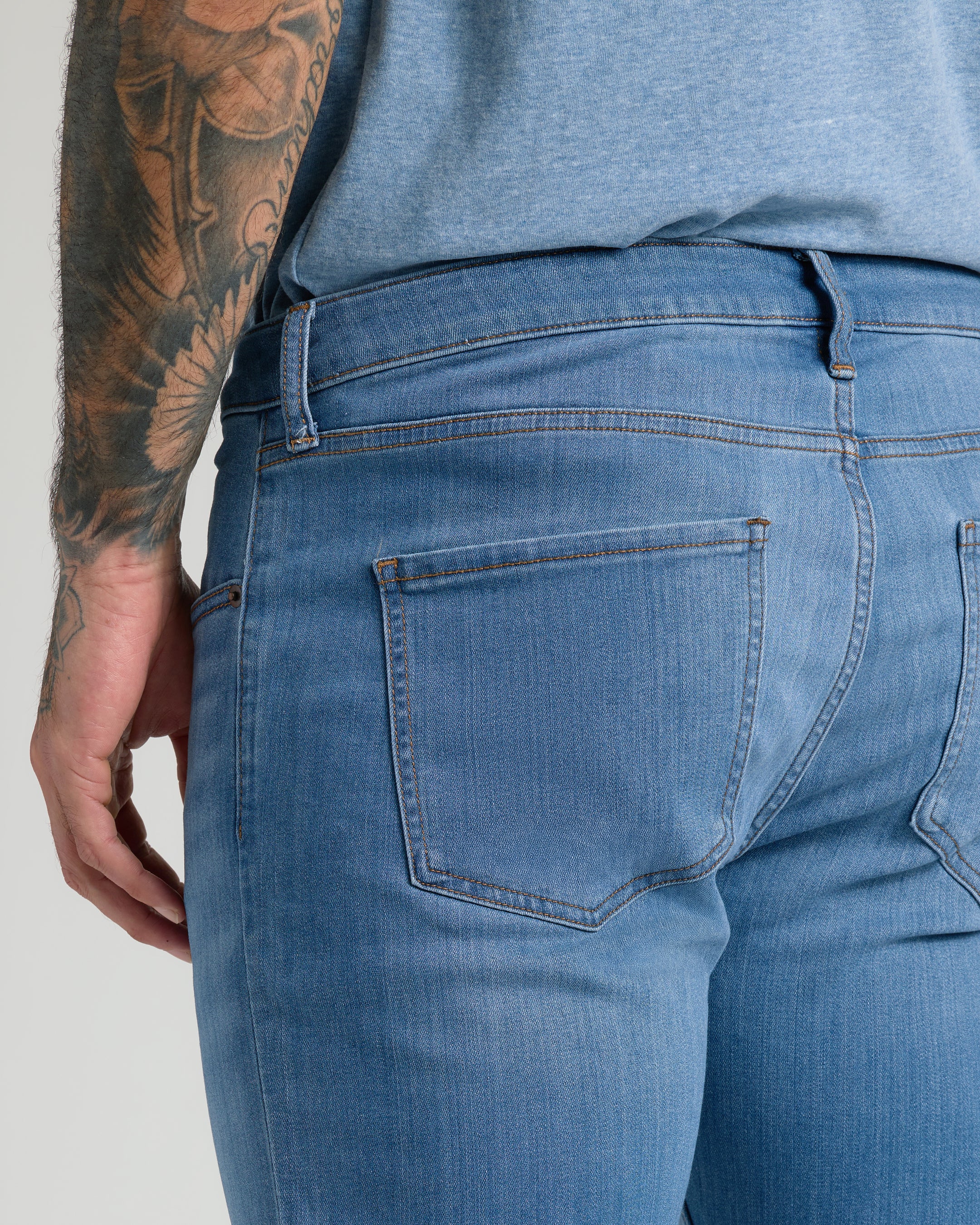 Men's straight fit high-stretch jeans in medium indigo wash - back pockets detail