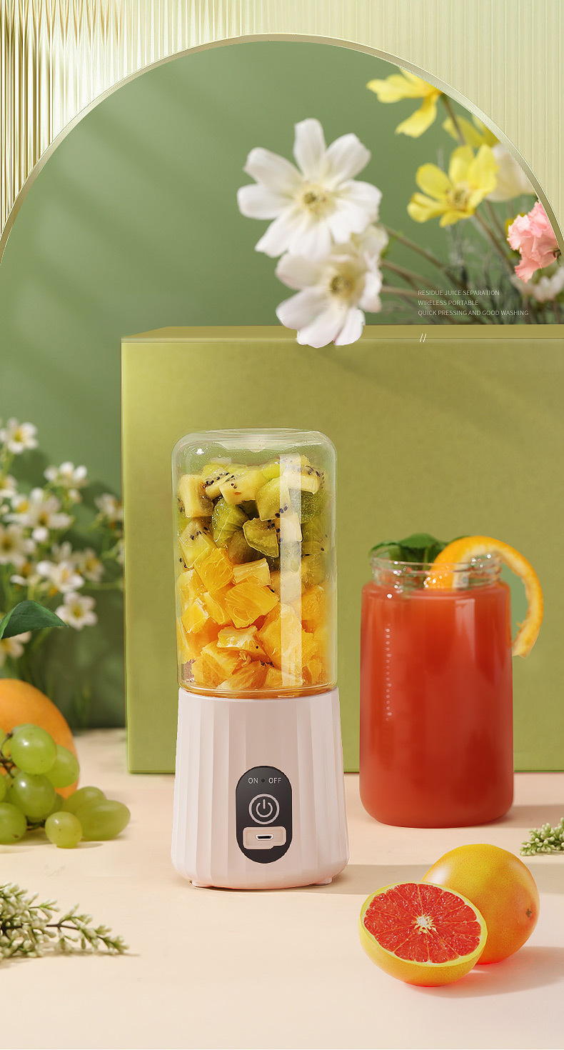 Juicer blending fresh fruits and vegetables