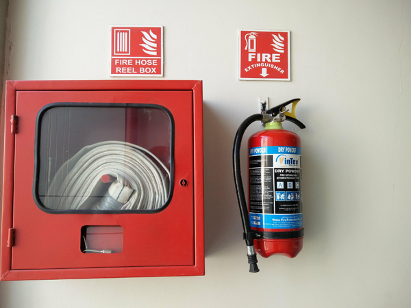 fire hose and fire extinguisher