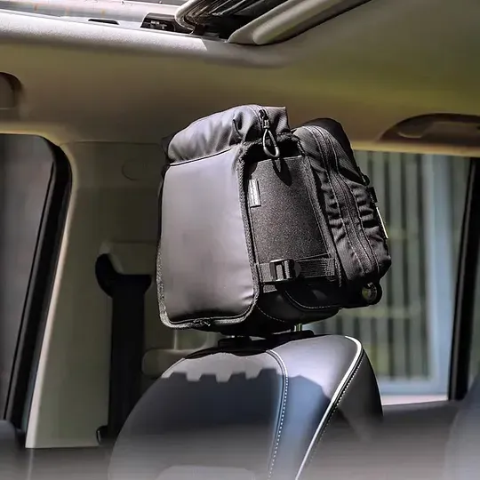 Tactical vehicle storage bag, rear seat headrest extended storage bag, suitable for camping and off-road gear storage.