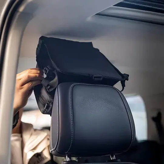 Tactical vehicle storage bag, rear seat headrest extended storage bag, suitable for camping and off-road gear storage.