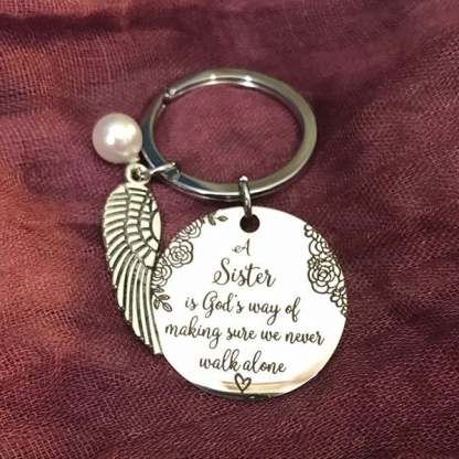 💓 "A Sister is God's Way of Making Sure We Never Walk Alone" Keychain