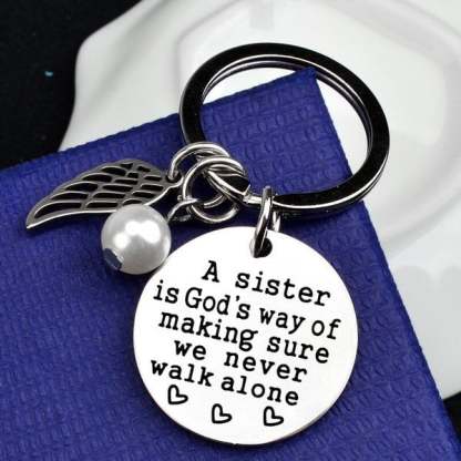 💓 "A Sister is God's Way of Making Sure We Never Walk Alone" Keychain