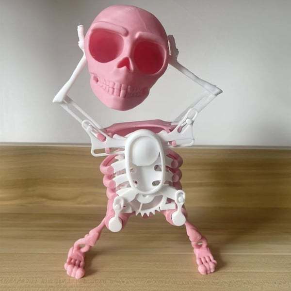 🔥Hot Sale-💀 Dancing and Swinging 3D Skull Toy