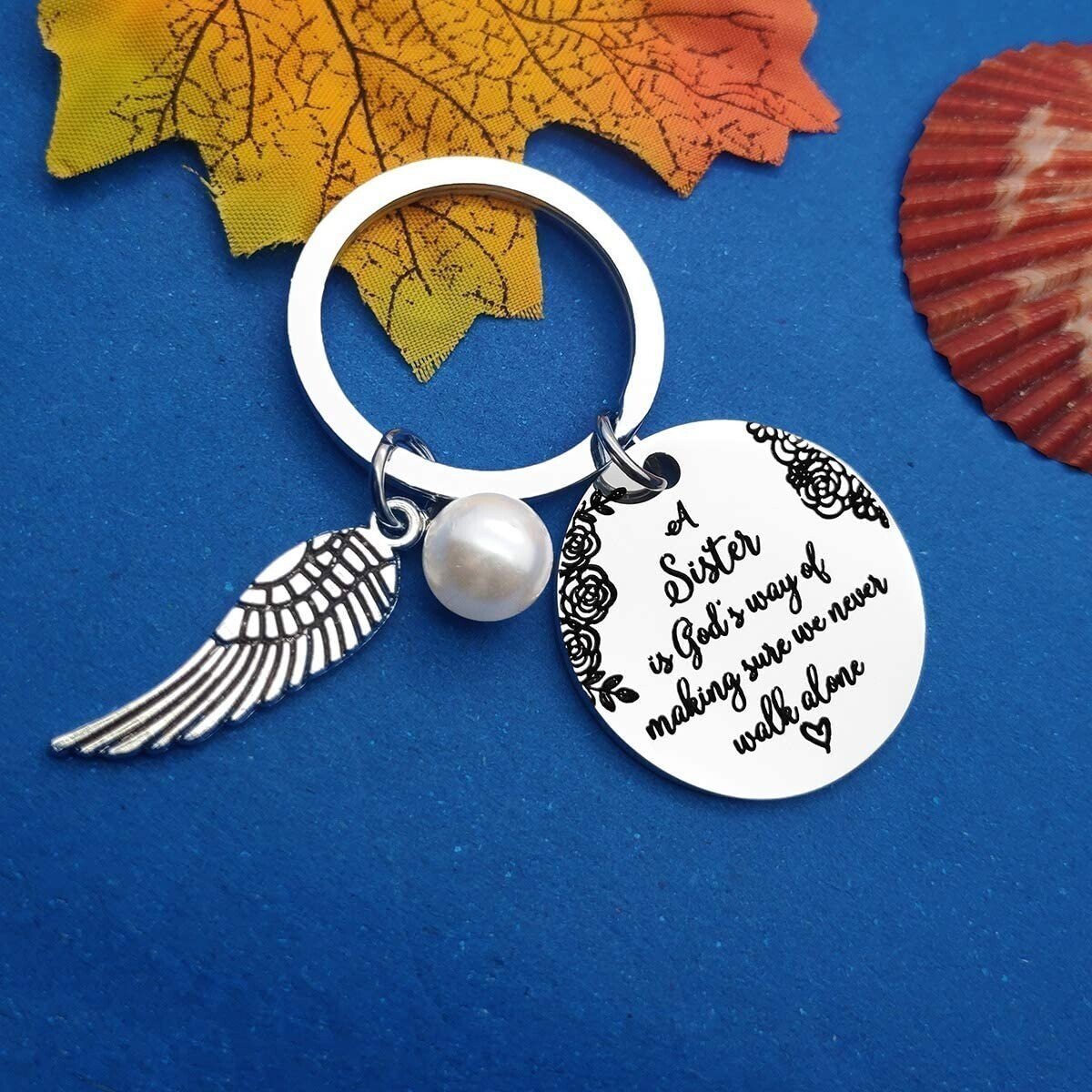 💓 "A Sister is God's Way of Making Sure We Never Walk Alone" Keychain