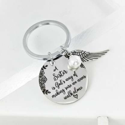 💓 "A Sister is God's Way of Making Sure We Never Walk Alone" Keychain