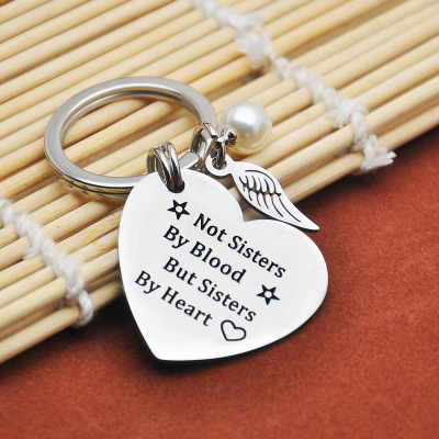 💓 "A Sister is God's Way of Making Sure We Never Walk Alone" Keychain