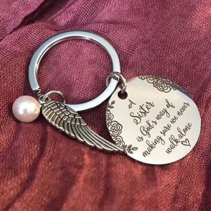 💓 "A Sister is God's Way of Making Sure We Never Walk Alone" Keychain