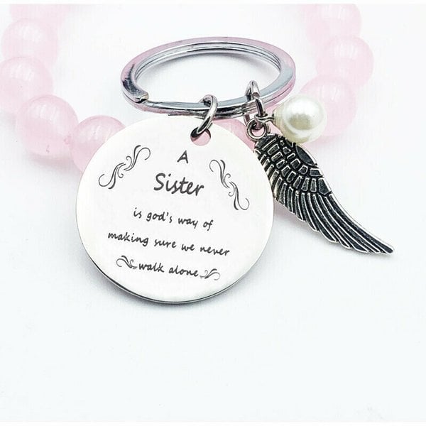 💓 "A Sister is God's Way of Making Sure We Never Walk Alone" Keychain