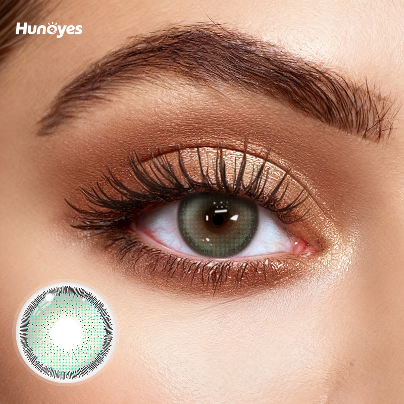 Close-up of Huneyes Aurora Green contact lens texture and design.