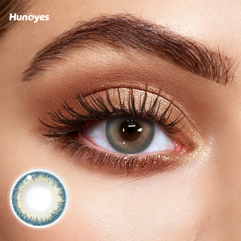 Close-up of Huneyes Bloom Blue contact lens texture and design.