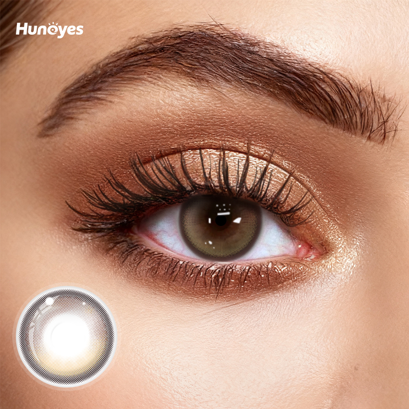 Close-up of Huneyes Candy Brown contact lens texture and design.