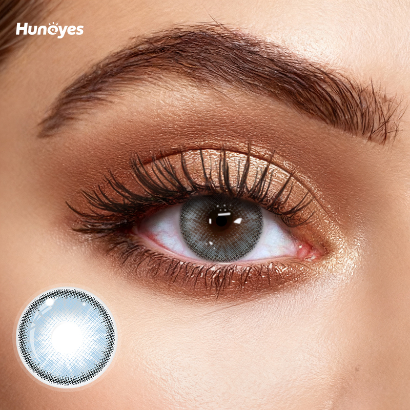 Close-up of Huneyes Dream Blue contact lens texture and design.