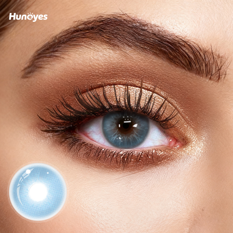 Close-up of Huneyes Sapphire Blue contact lens texture and design.