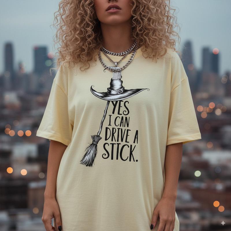 “YES I CAN DRIVE A STICK.” Witch Pun Halloween Crewneck Tees