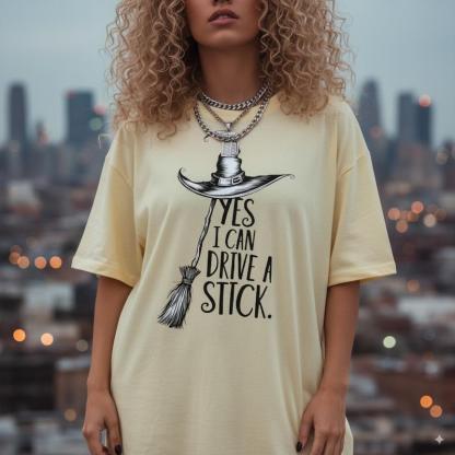 “YES I CAN DRIVE A STICK.” Witch Pun Halloween Crewneck Tees