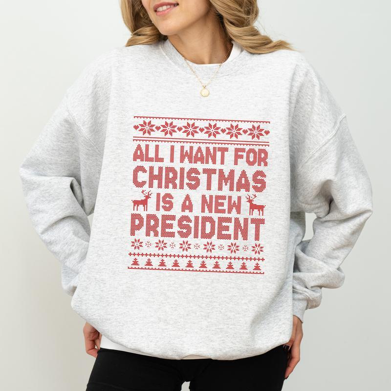 Political Humor Christmas Sweatshirt - “All I Want for Christmas Is a New President” Ugly Sweater Style Apparel
