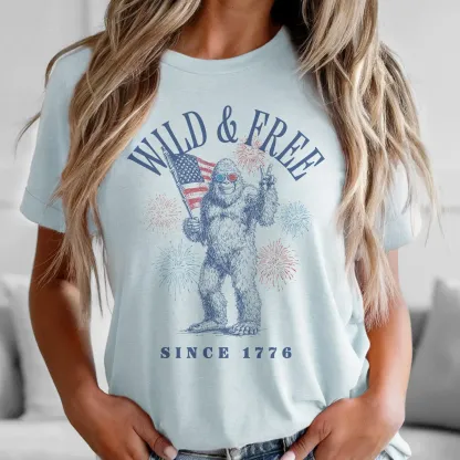 Wild & Free Bigfoot Patriotic Graphic Tee – Retro 4th of July Independence Day Casual T-Shirt