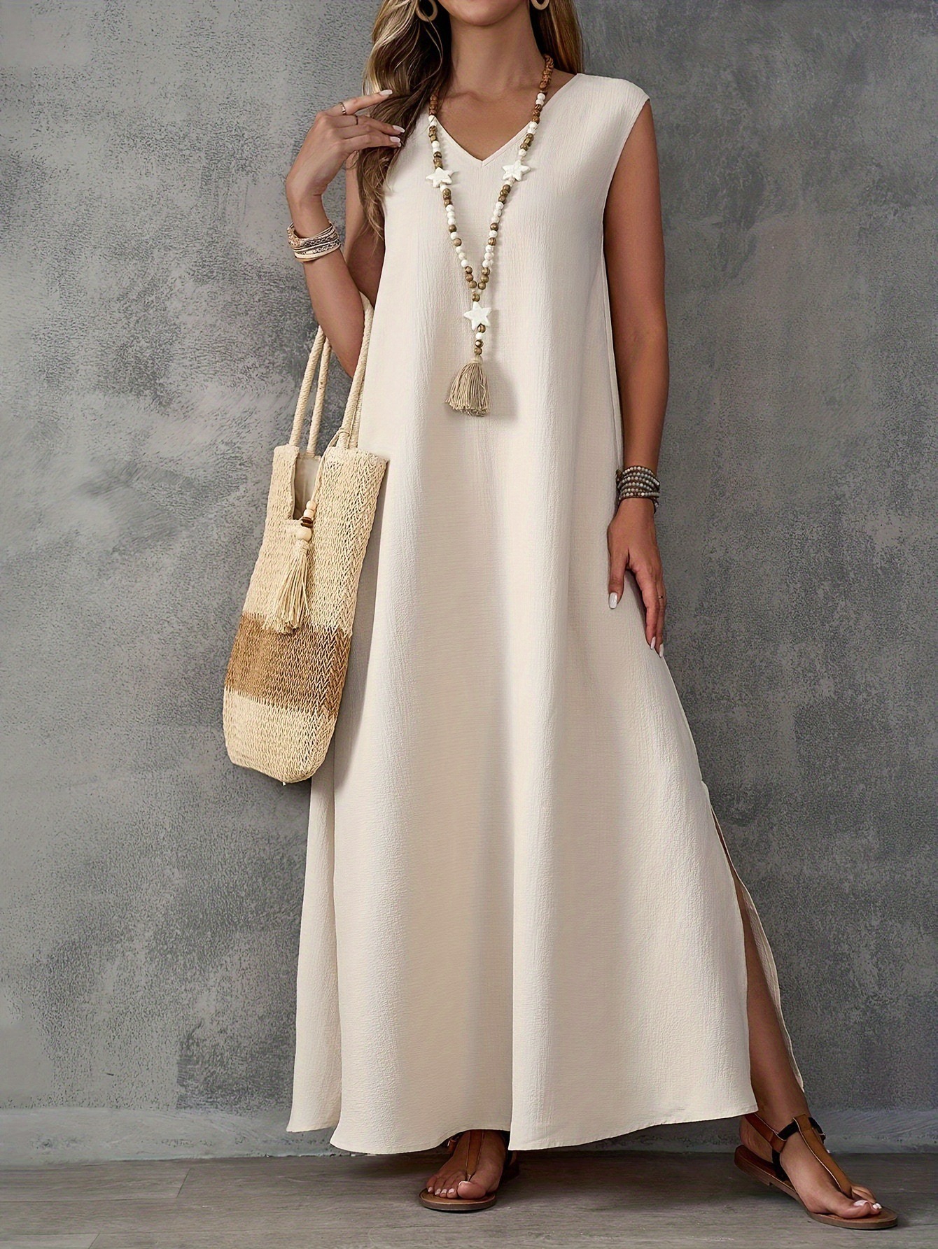 Elegant sleeveless V-neck dress with side slits