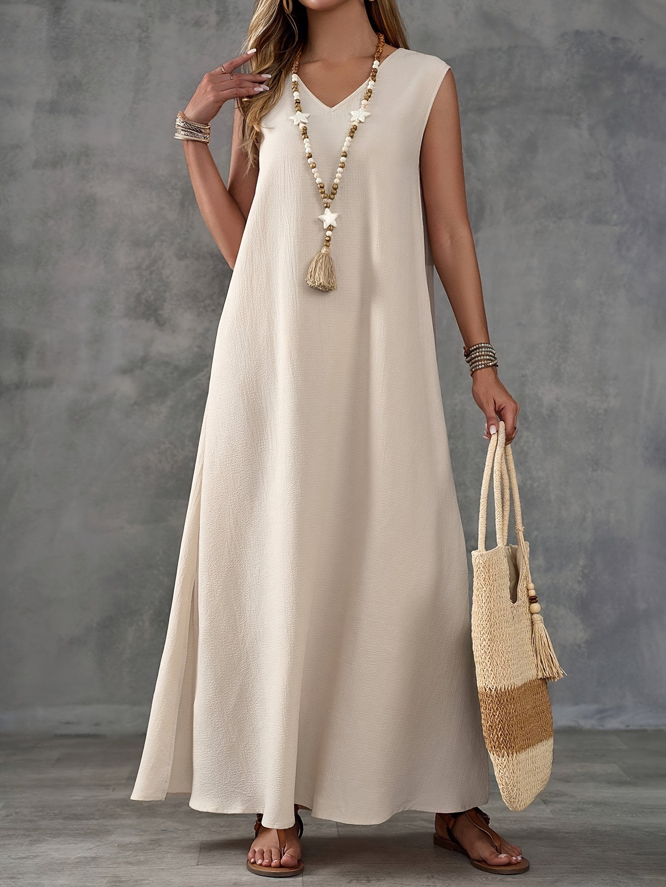 Elegant sleeveless V-neck dress with side slits
