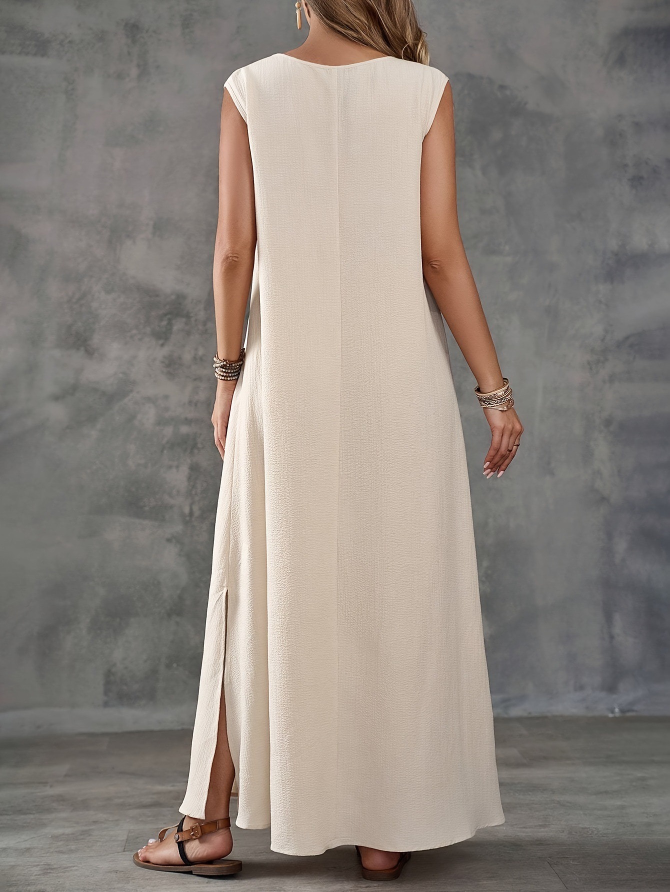 Elegant sleeveless V-neck dress with side slits