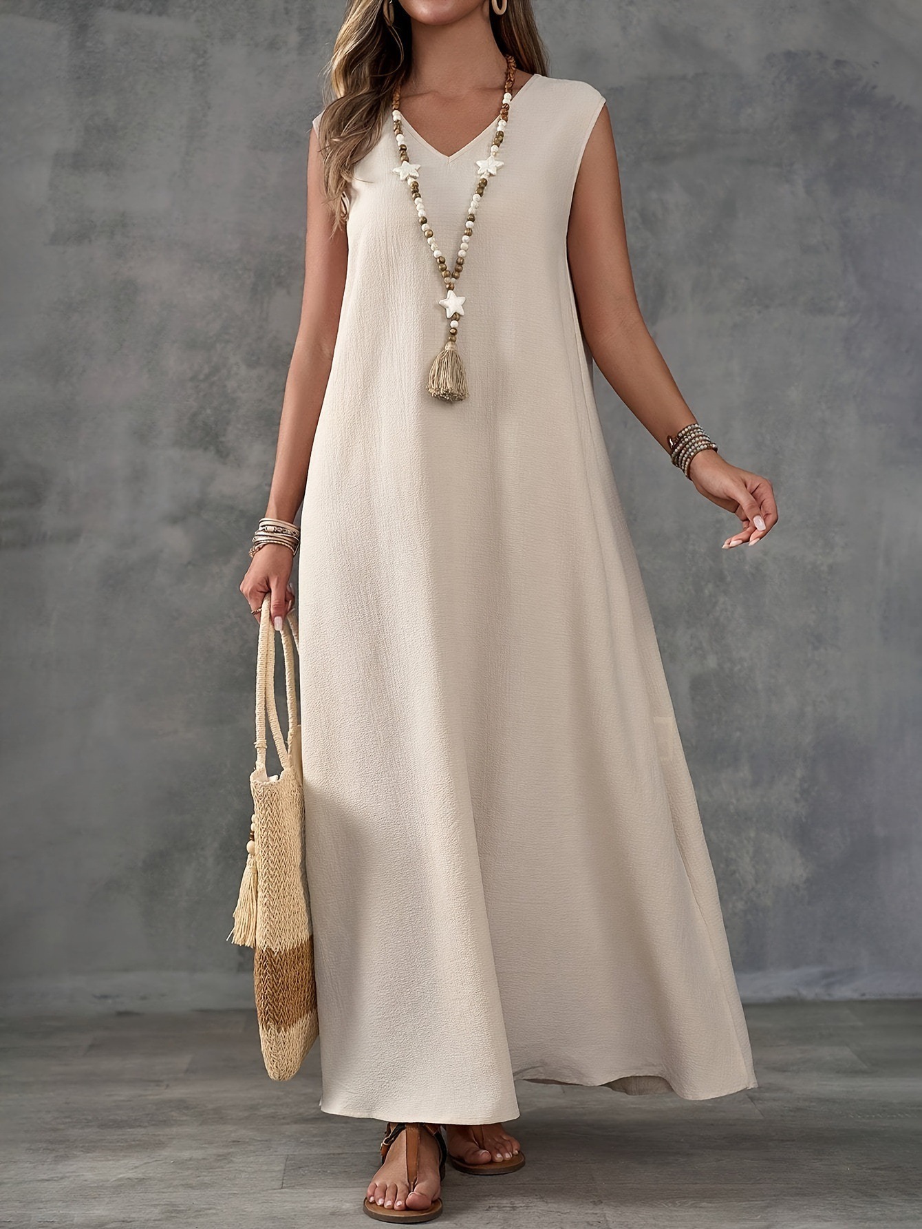 Elegant sleeveless V-neck dress with side slits