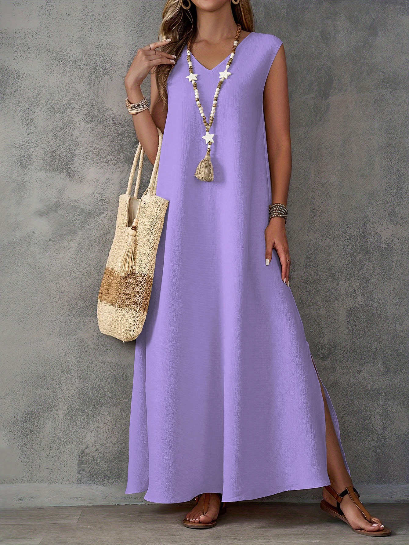 Elegant sleeveless V-neck dress with side slits