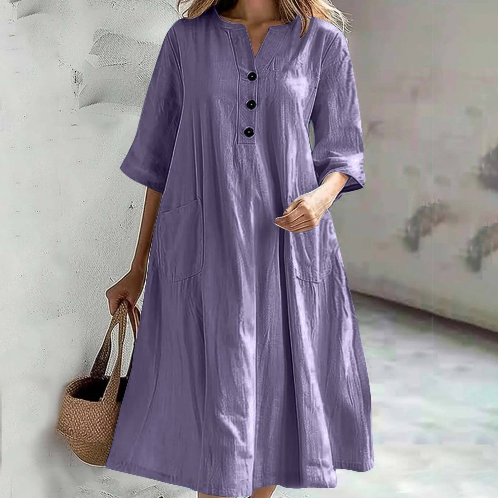 Mid-length V-neck half-sleeve cotton and linen loose version three-button pocket dress