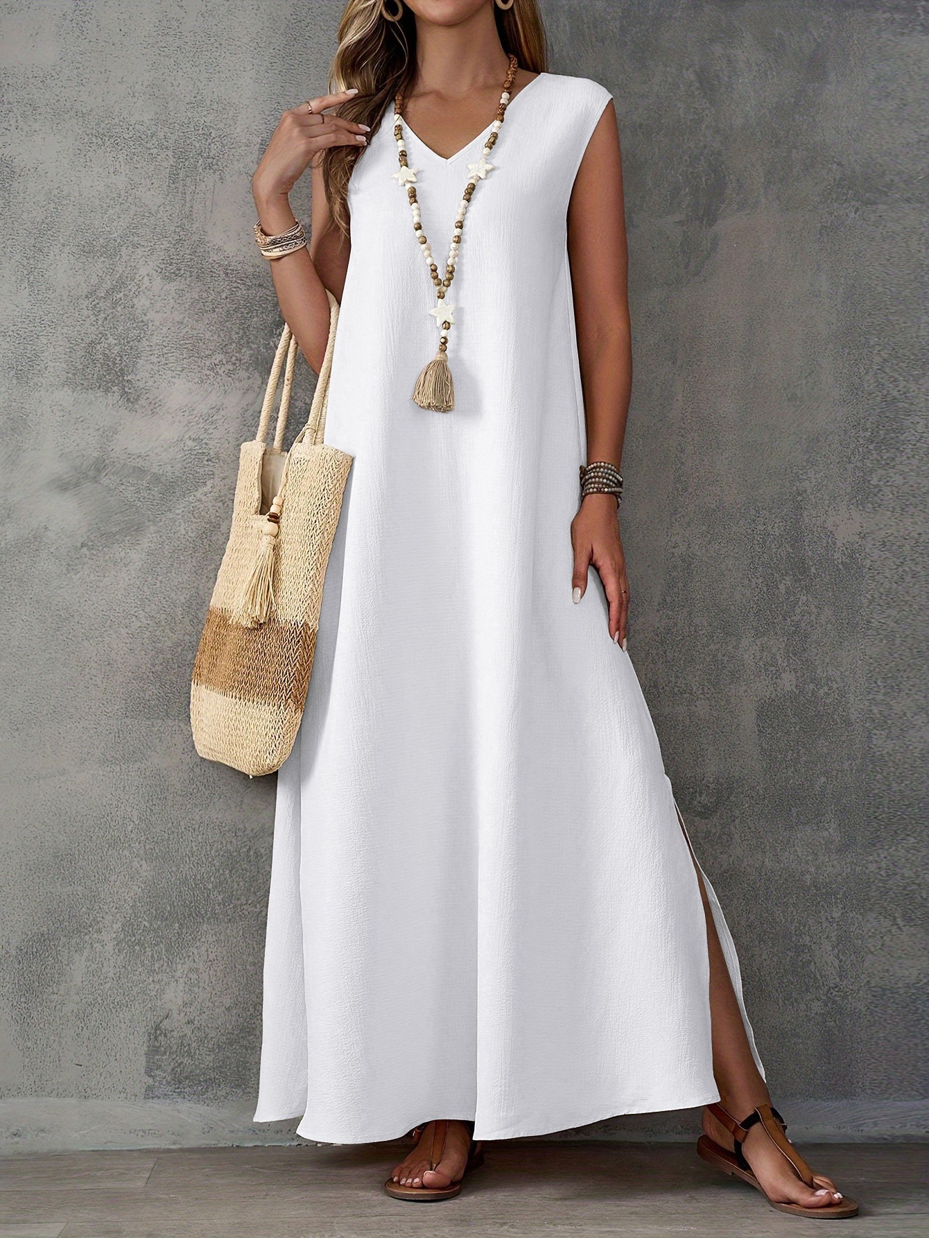 Elegant sleeveless V-neck dress with side slits
