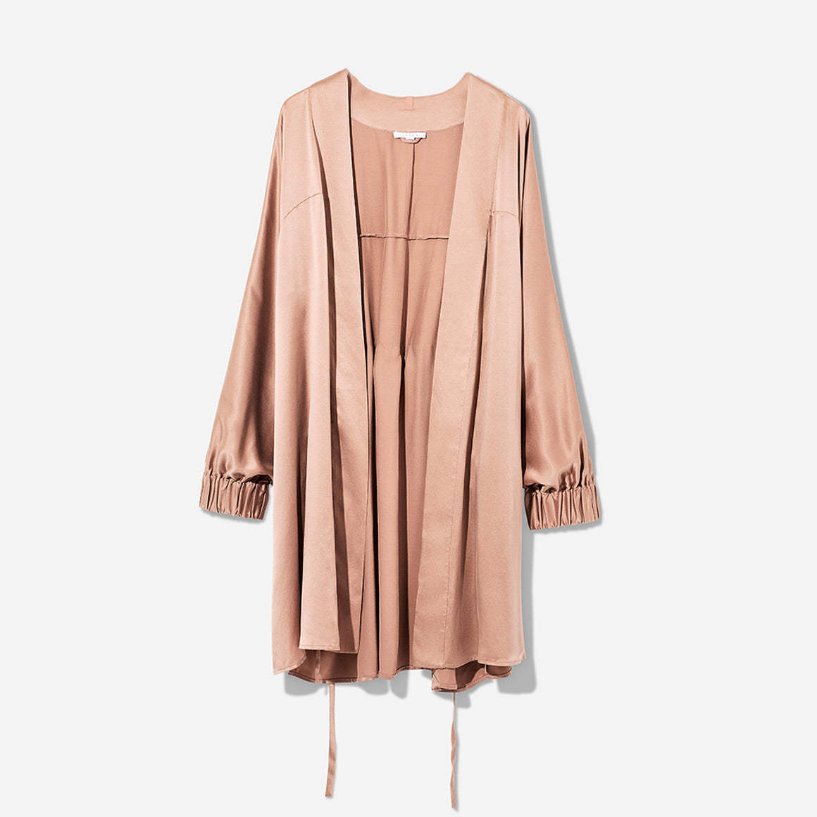 The Washable Silk Robe features a relaxed fit with a waist belt and pockets for added convenience. The lightweight and breathable fabric makes it perfect for layering over your favorite pajamas or loungewear. Machine washable.