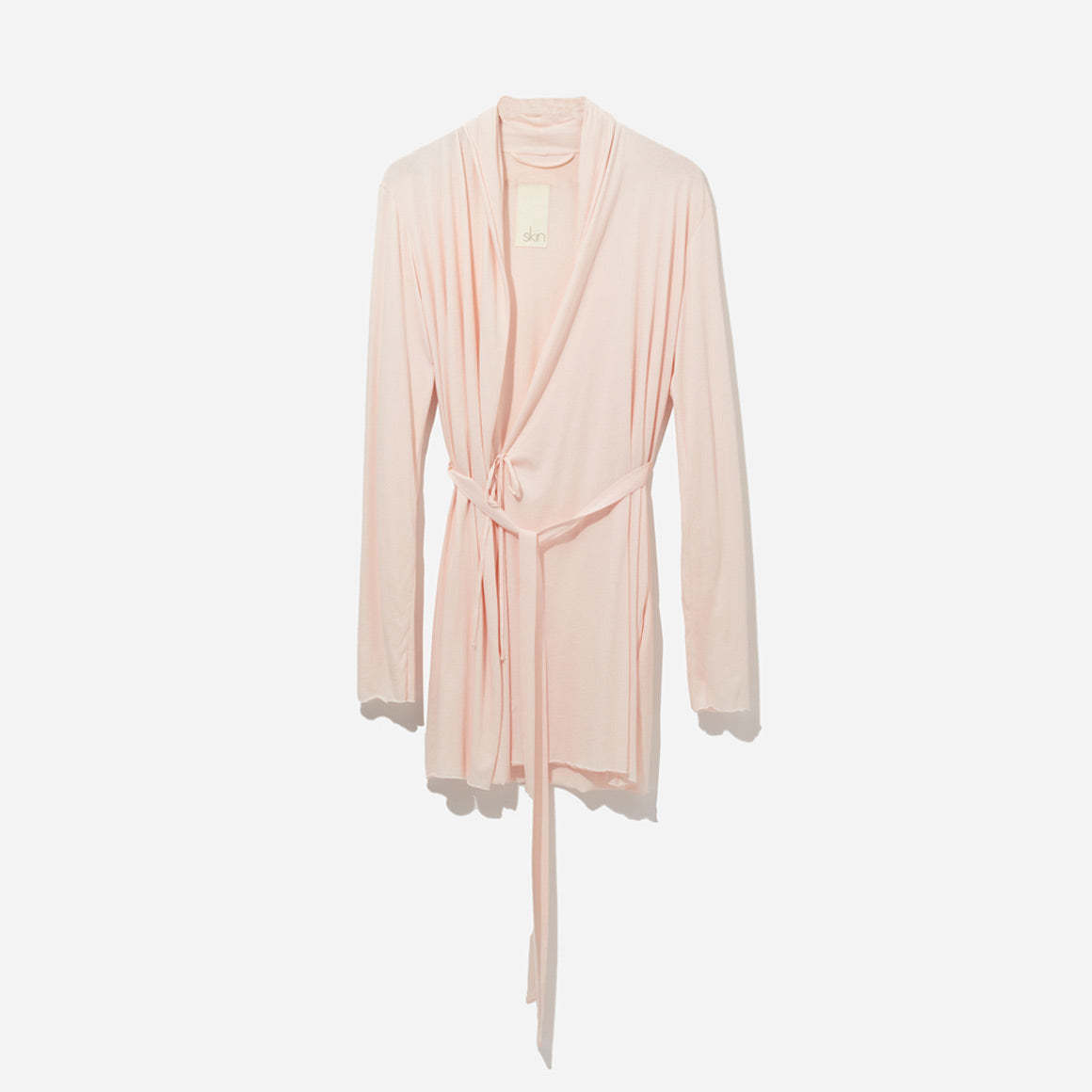 The double layer construction adds an extra touch of opulence and coziness to this robe. It provides a lightweight yet substantial feel, making it perfect for year-round wear. The wrap design with a self-tie belt allows you to customize the fit according to your preference, ensuring the perfect fit every time.