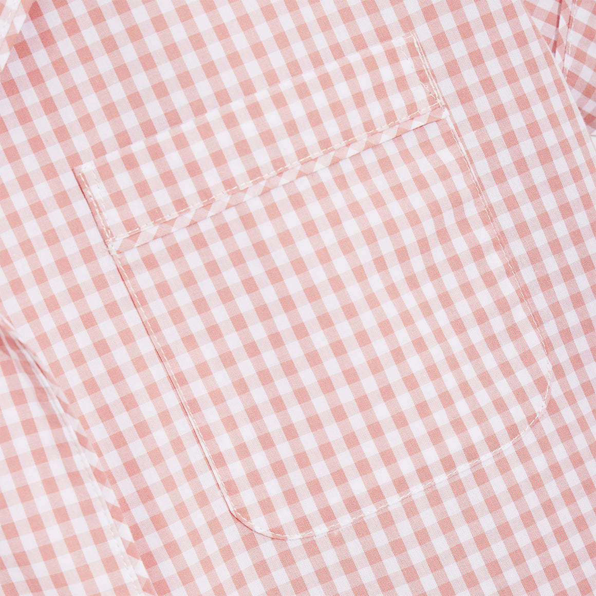 Our short sleeve pajama set features a relaxed fit, and includes a classic button-up top with a camp collar and chest pocket. The matching shorts feature an elastic waistband and drawstring for a custom fit, and convenient side-seam pockets.