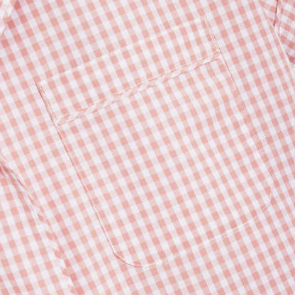 Our short sleeve pajama set features a relaxed fit, and includes a classic button-up top with a camp collar and chest pocket. The matching shorts feature an elastic waistband and drawstring for a custom fit, and convenient side-seam pockets.