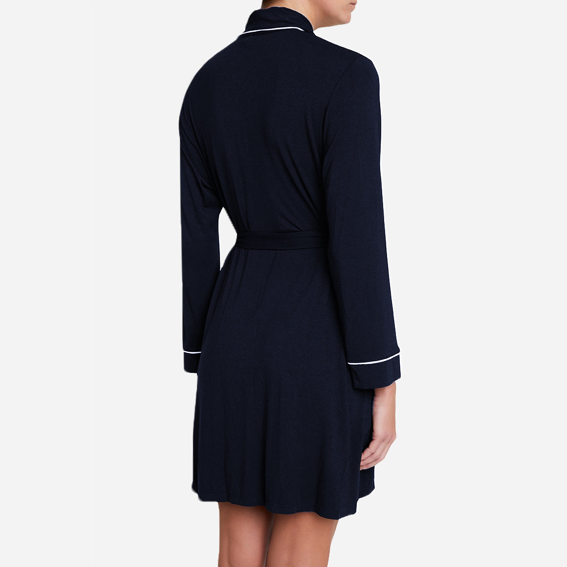 The Gisele Robe features a classic silhouette with a flattering knee-length cut, making it suitable for lounging at home or for a relaxed yet chic look when entertaining guests. The self-tie belt allows you to adjust the fit to your preference, while the wide lapel collar adds a touch of elegance.