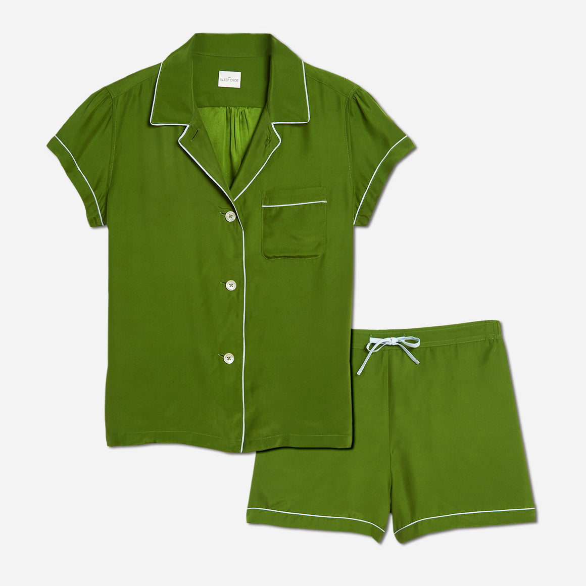Our short sleeve pajama set features a relaxed fit, providing you with a comfortable and stylish option for warmer weather. The pajama set includes a classic button-up top with a collar, while the matching shorts feature a comfortable elastic waistband, drawstring, and side-seam pockets.
