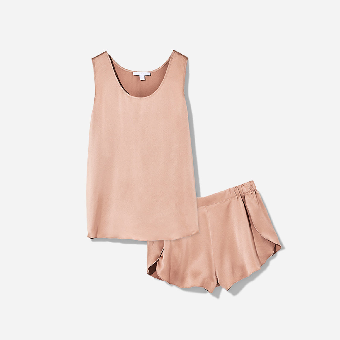 The set includes a sleeveless tee and relaxed-fit shorts, both crafted from breathable silk fabric that is lightweight, comfortable, and machine washable. The shorts feature an elastic waistband for a perfect fit, while the top is designed with a flattering neckline and relaxed fit that drapes beautifully on the body.