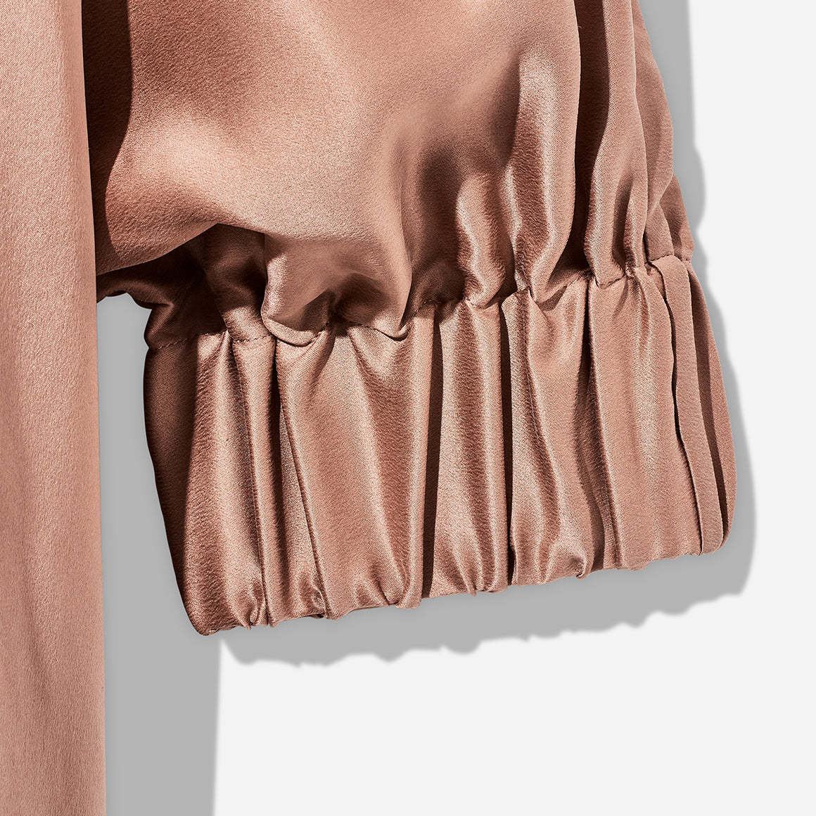 The Washable Silk Robe features a relaxed fit with a waist belt and pockets for added convenience. The lightweight and breathable fabric makes it perfect for layering over your favorite pajamas or loungewear. Machine washable.