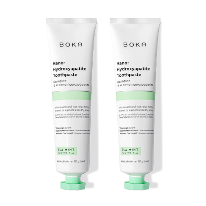 Two tubes of n-Ha Toothpaste 2-Pack to remineralize teeth, shown on a black background.