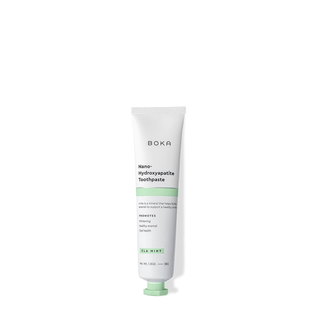 Ela Mint Travel Size n-Ha Toothpaste in a white tube with mint flavor shown on a black background.