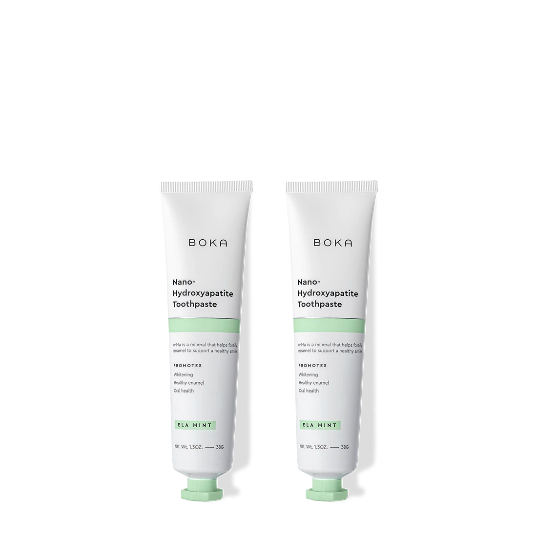 Two tubes of Ela Mint Travel Size n-Ha Toothpaste stand upright on a plain background.