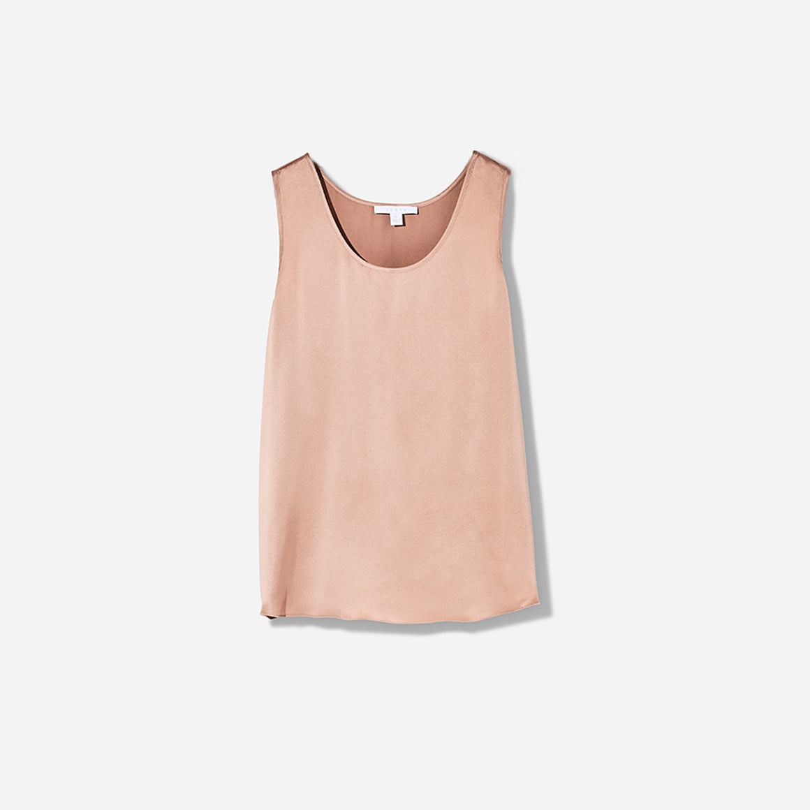 The set includes a sleeveless tee and relaxed-fit shorts, both crafted from breathable silk fabric that is lightweight, comfortable, and machine washable. The shorts feature an elastic waistband for a perfect fit, while the top is designed with a flattering neckline and relaxed fit that drapes beautifully on the body.